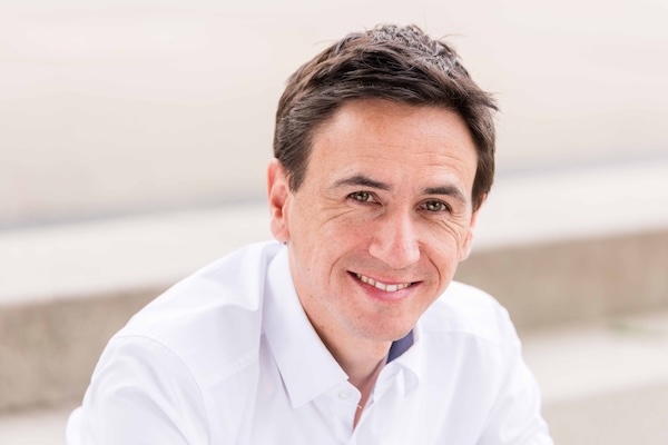 Photo of Adrian Neumeyer, a project manager who created Caperity, a simple resource management software for project-driven teams.